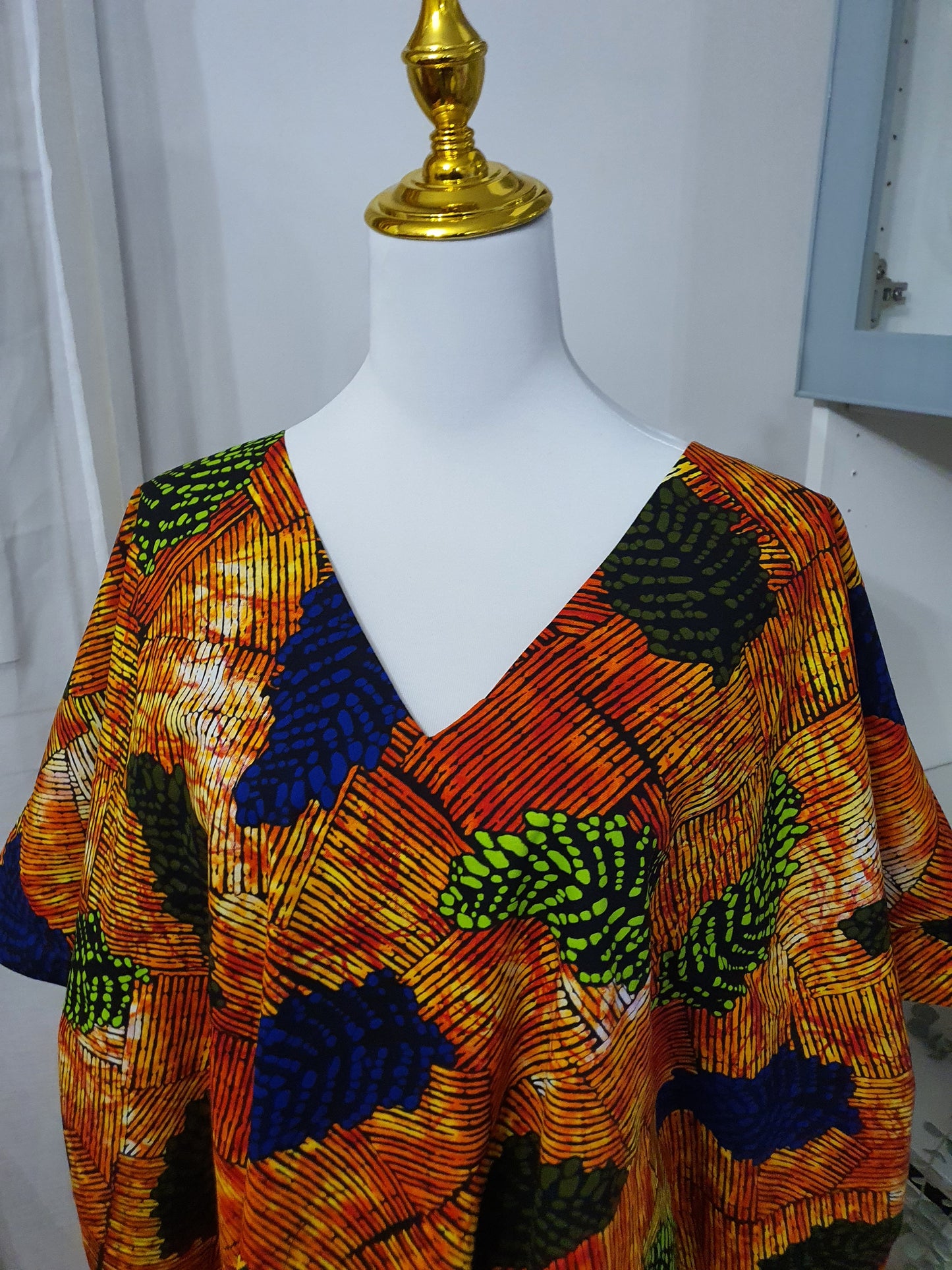 Robe africaine à frange feuillage multicolore et franges jaunes