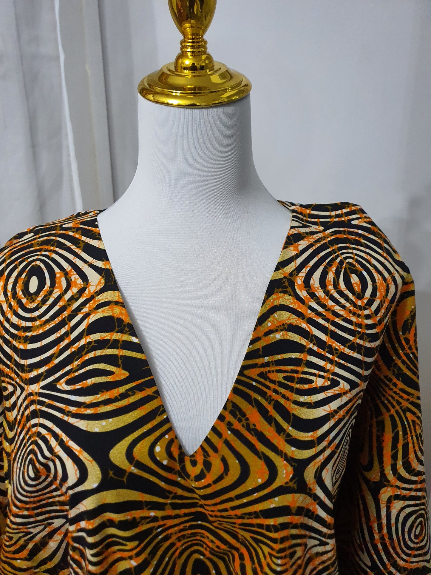 Robe africaine à frange tissu orange & noir avec poches modernes